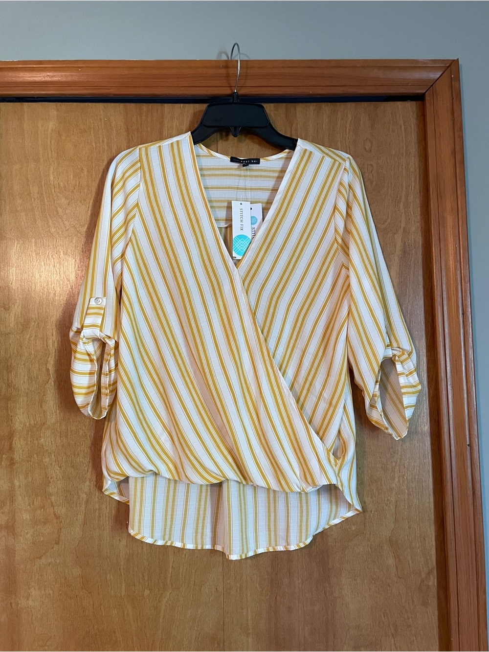 Striped Yellow Wrap Blouse with Roll-Tab Sleeves